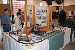 Visitors at Museum booth at Puyallup Train Expo.