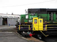 BNSF locomotive on turntable during Museum Volunteers tour of this railway landmark