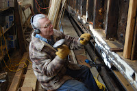 Volunteer Alan W repairs side sill of Coach 218