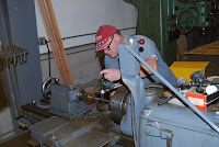 Volunteer Ray M treads rod for Coach 218 restoration.