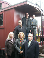 Members of the King County Landmarks Commission: In the first row, from left to right, are Lauren McCroskey, Lynette Weber and Tom Hitzroth. Rick Chouinard is in the middle. On the platform of the 001 Caboose are Steve Day and Brian Rich. Not pictured are Bob Weaver, Susan Ranf and Kathryn Merlino.