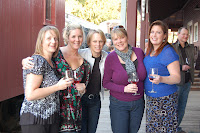 Attendees enjoy glasses of wine at Save Our Rails event on April 9, 2009.