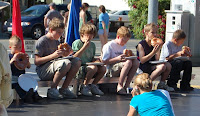 Local children participating in donut contest.