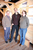 Richard Anderson, Gary Tarbox and Jessie Cunningham standing inside Wellington Remembered Exhibit.