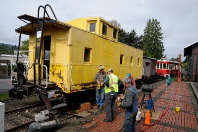 Men working on caboose.