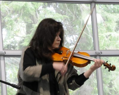 Lenore Vardi performs with violin.