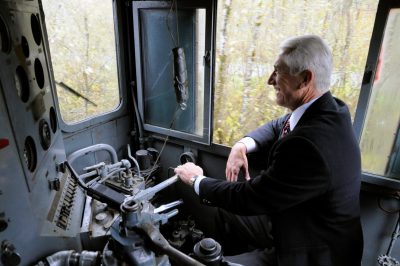 Congressman Dave Reichert operates locomotive 4012 en route to the Railway History Center.