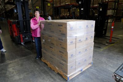 Susan Hankins picking up a pallet of cookie dough from Krusteaz.
