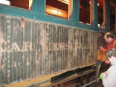 Revealing the original Chapel Car lettering on the siding