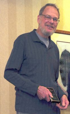 Hugh with award
