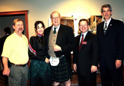 North Bend Mayor Ken Hearing, actors Denise Paulette and Gary Schwartz, Northwest Railway Museum Executive Director Richard Anderson, Snoqualmie Mayor Matt Larson stand together at event.