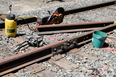 Special compromise joint bars transition between the new welded rail and the existing rail. (Note the different height.)