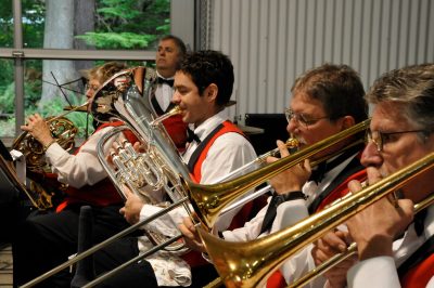 A concert band plays music inside the Train Shed during its dedication.