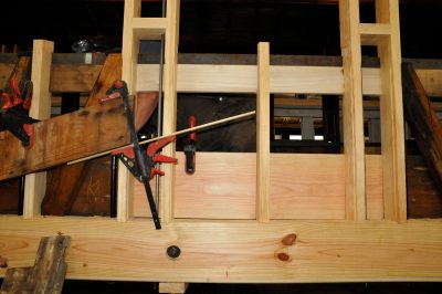 Exterior photo of replacement framework being assembled on the Chapel Car. 