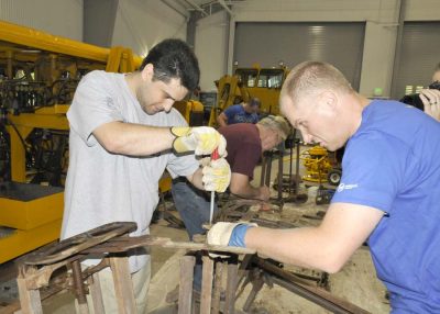 Day of Caring 2012 volunteers rehabilitate coach seats for SP&S 218 in the Train Shed