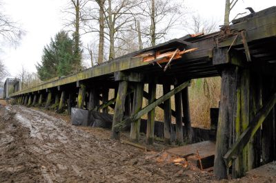 Bridge 35 showing the aftermath damage of a tree falling on it.