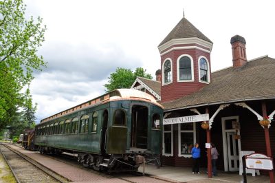 SP&S 218, with NRM 4024 behind, sit at Snoqualmie Depot on the track next to the depot for moving collections from Snoqualmie to RHC.