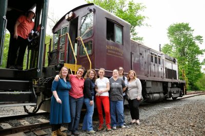 Staff and Reinforcement Crew pose for a photo with SP&S 218 and the Museum's 4024 behind during the move of records from Snoqualmie to the RHC.