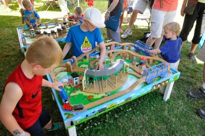 Young visitors play at train tables during DOWT 2014.