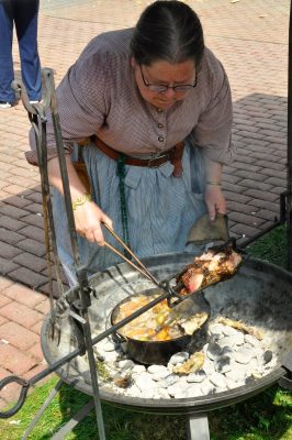 Fort Nisqually reenactor makes traditional chicken stew at SRD 2014.