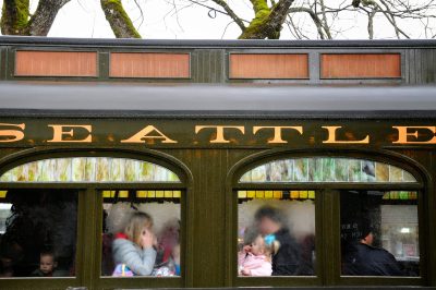 Passengers ride SP&S 218 during a wet Santa Train 2014.