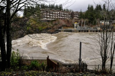 The top of Snoqualmie Falls with Salish Lodge and the Hydroelectric plant during the January 2015 flooding.