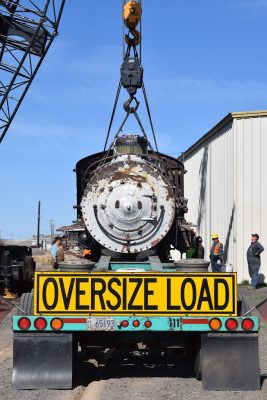 Is this locomotive smiling?  The front smokebox door appears to have a smiley face.