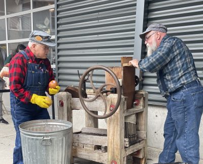 Earl and Tom running the cider press Halloween Train 2023.