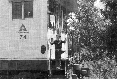 A young boy on the steps of Weyerhaeuser #1, now #714 at Vail, between 1975-76.