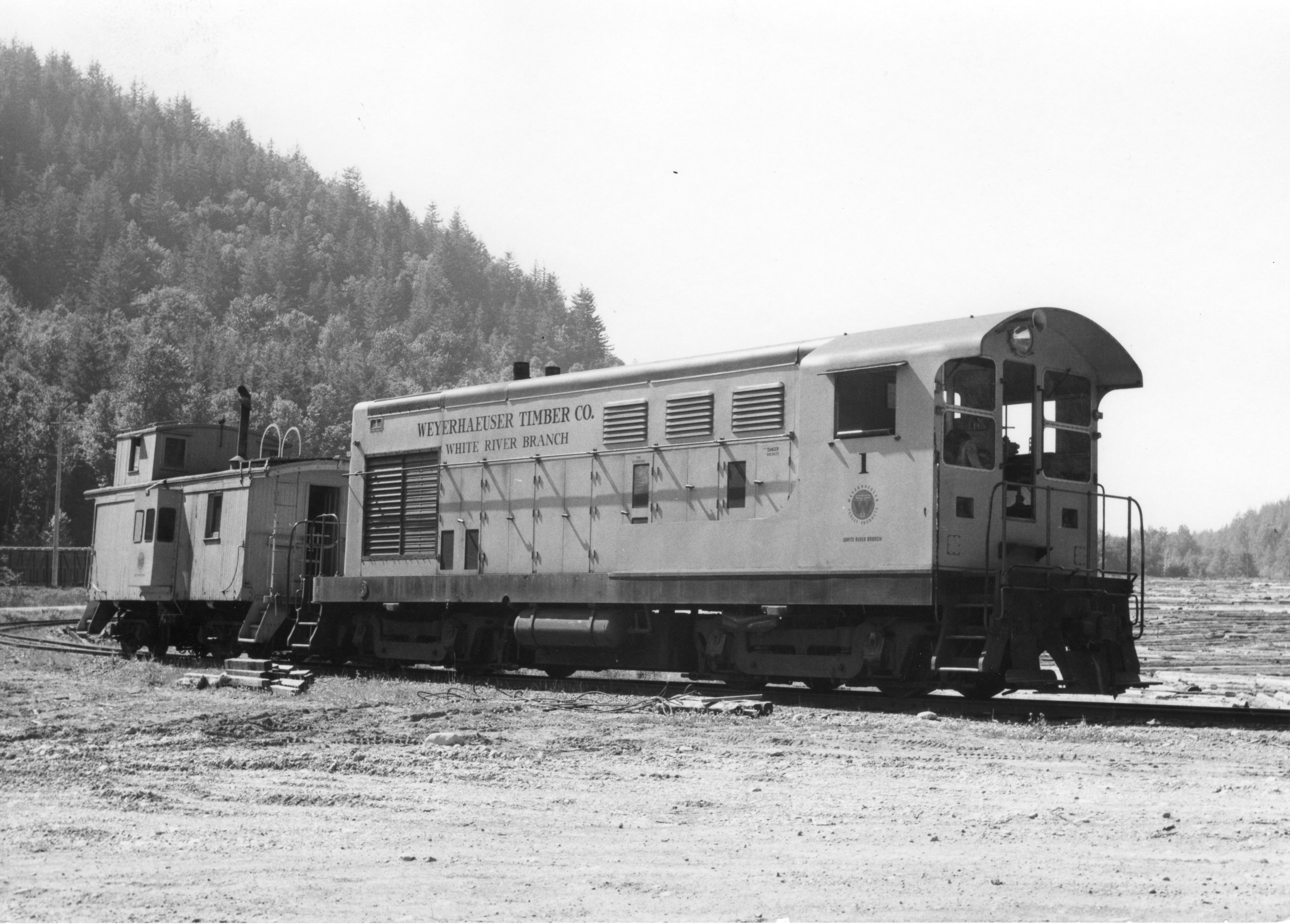 Weyerhaeuser #1 in service at Enumclaw with caboose.