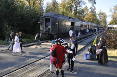 Costumed families head for the train at the RHC during Halloween Train 2024