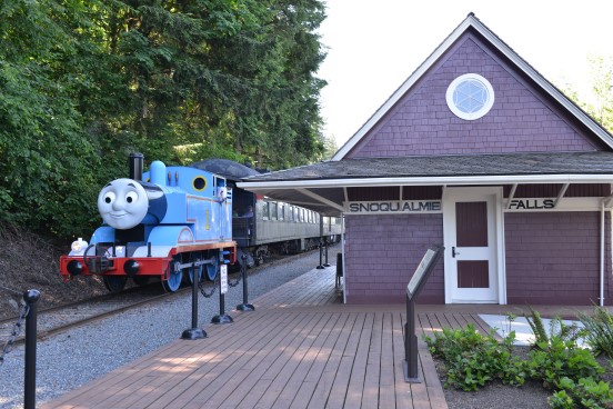 Thomas the Tank Engine passing by the Snoqualmie Falls depot