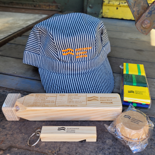 Embroidered NRM hat with wood toys.