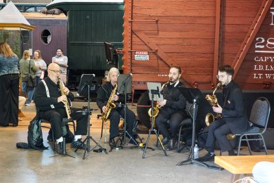The Eastside Saxophone Quartet plays in the Train Shed Exhibit Hall.