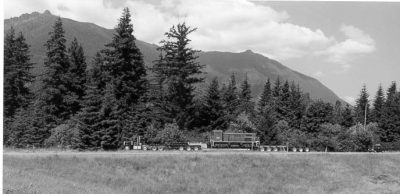 RS-4-TC #4012 aboard a lowboy trailer leaves I-90 with Mt. Si in the background.